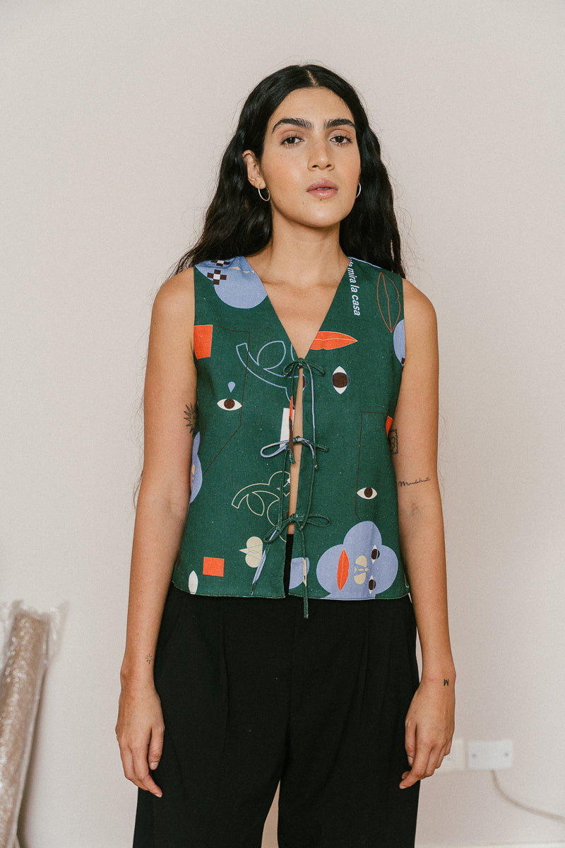 FACES WE SEE vest