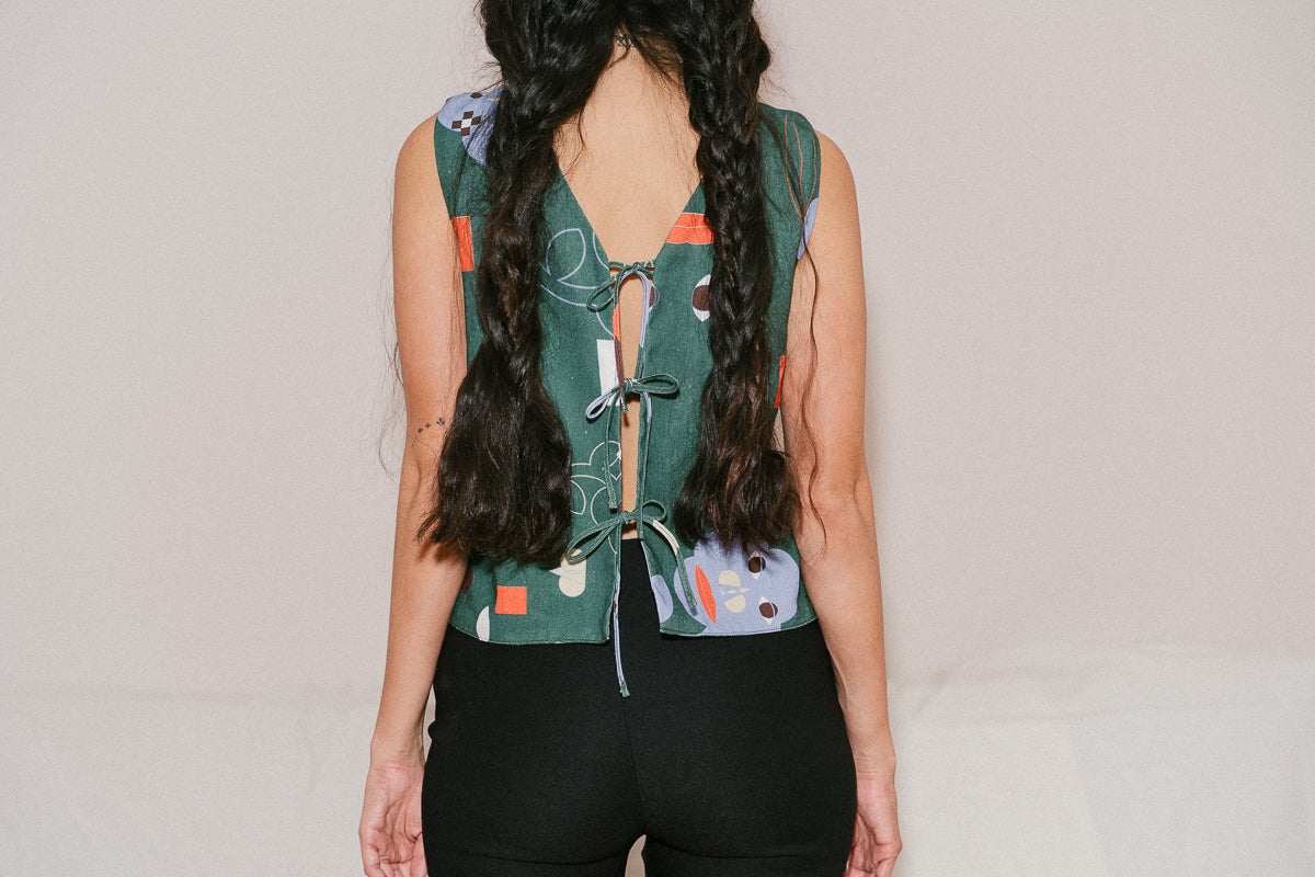 FACES WE SEE vest